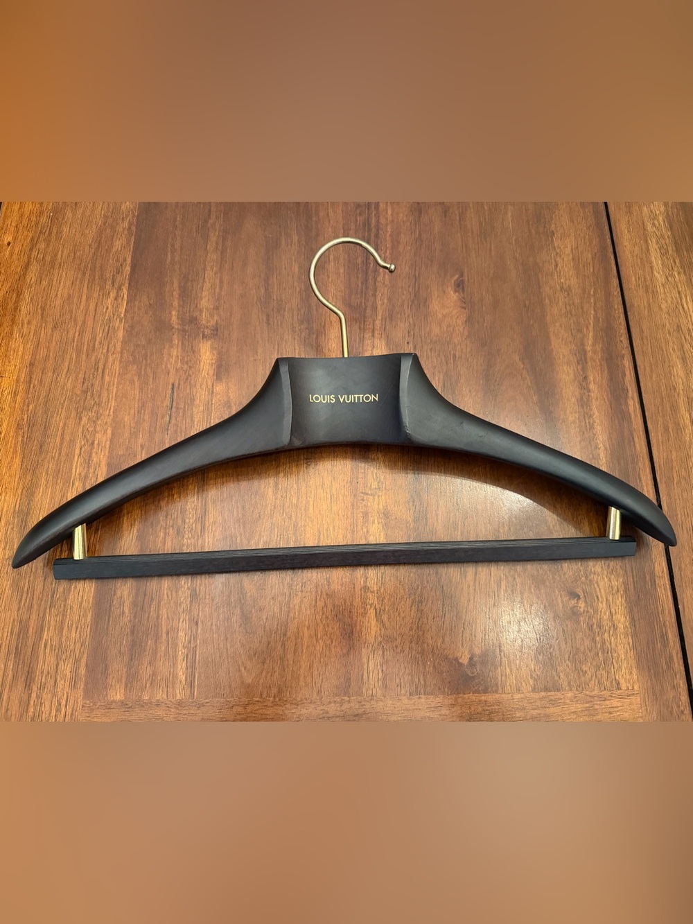 Louis Vuitton Black Wooden Hanger with Gold Hook